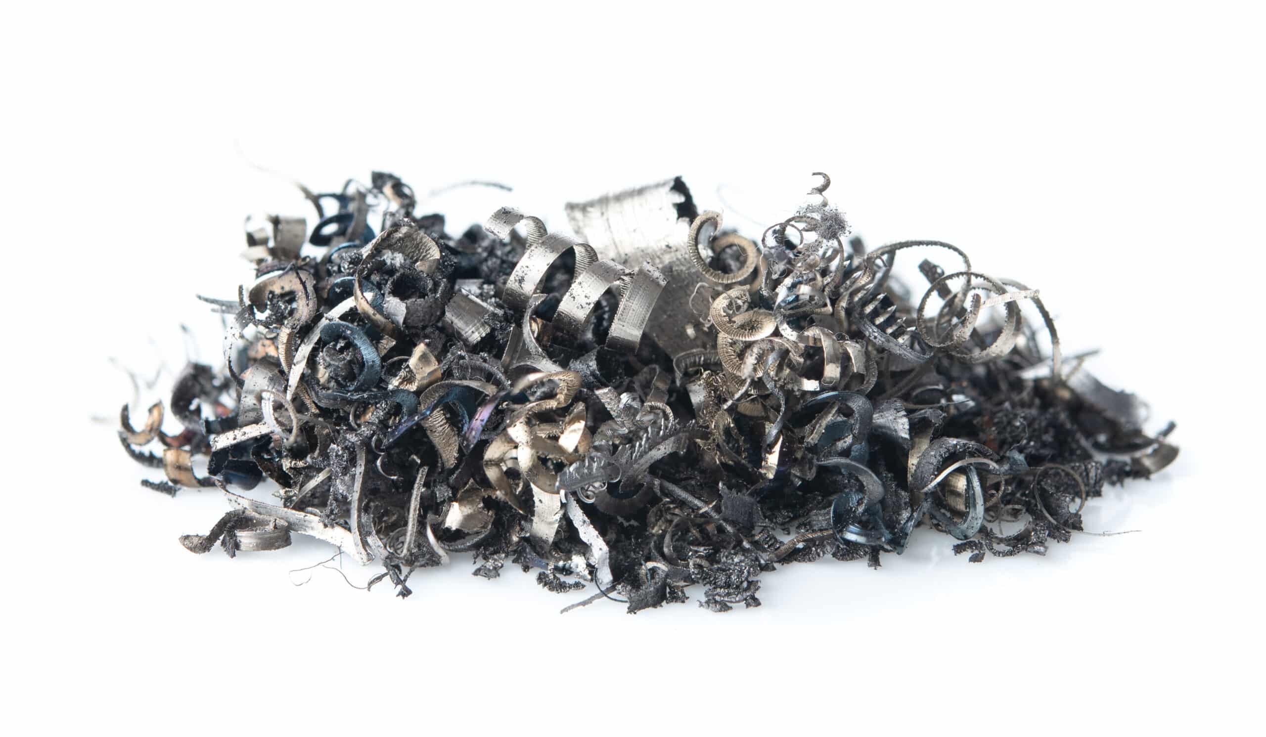 Pile of scrap metal shavings isolated on white background