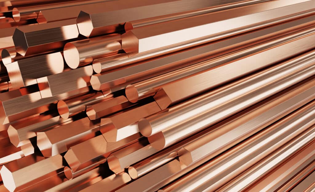 Copper metal products. Stack of round, square, hexagonal copper