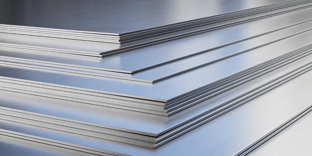 Steel sheets in warehouse, rolled metal product.