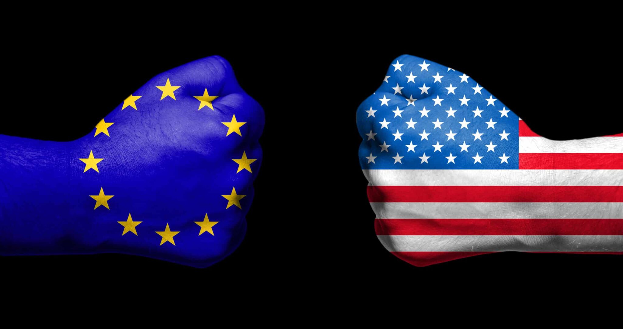Flags of European Union and USA painted on two clenched fists fa