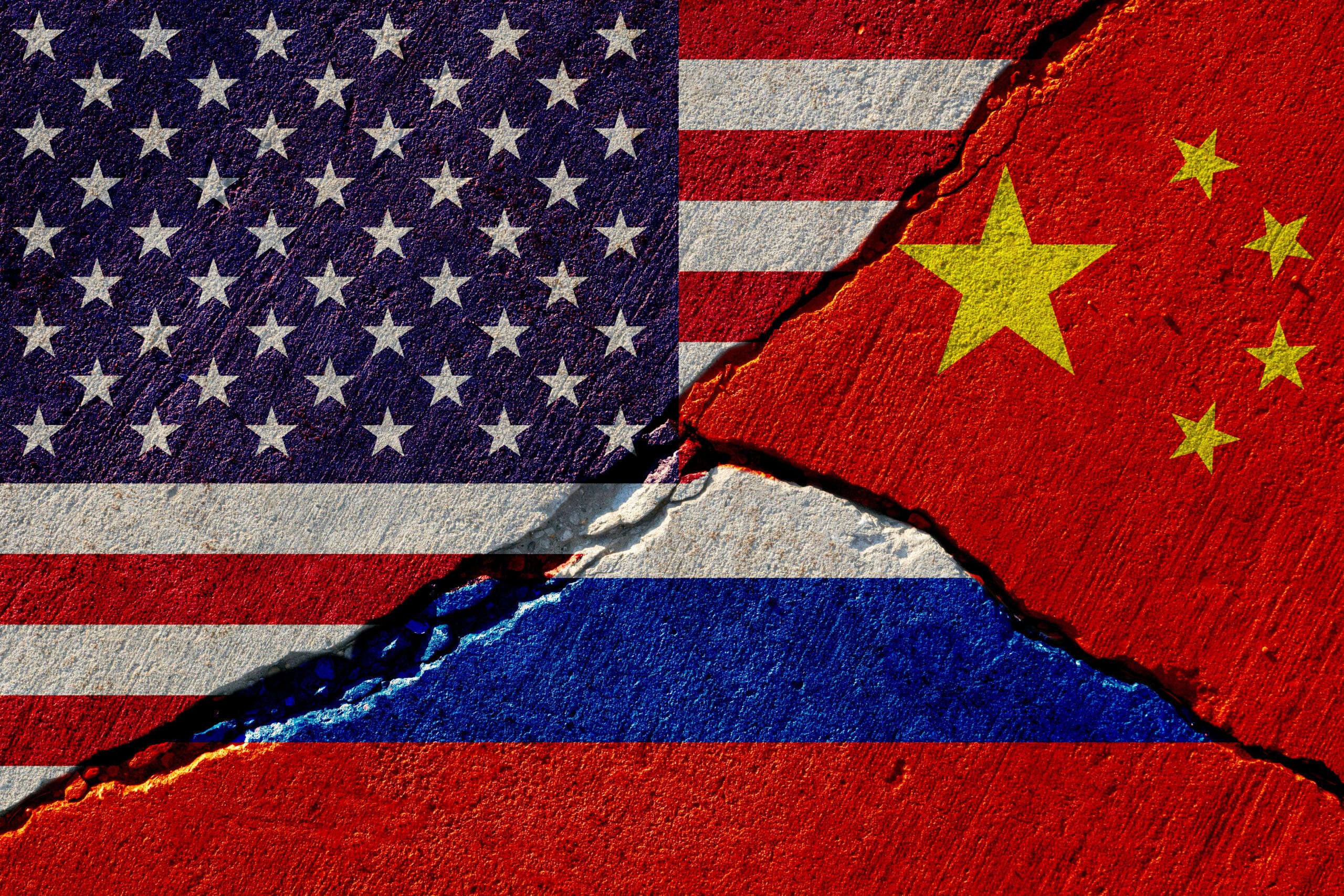 concrete-wall-with-painted-united-states-china-and-russia-flags